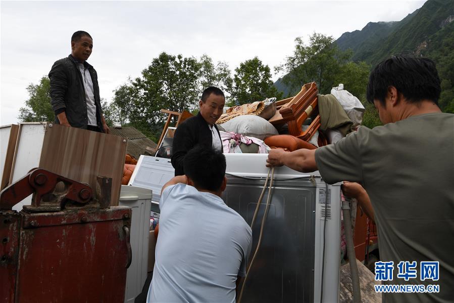 （新華全媒+）（9）千里“挪窩”，踏實(shí)開啟新生活