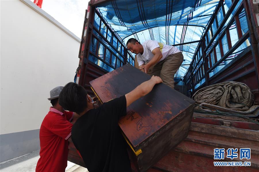 （新華全媒+）（26）千里“挪窩”，踏實(shí)開啟新生活