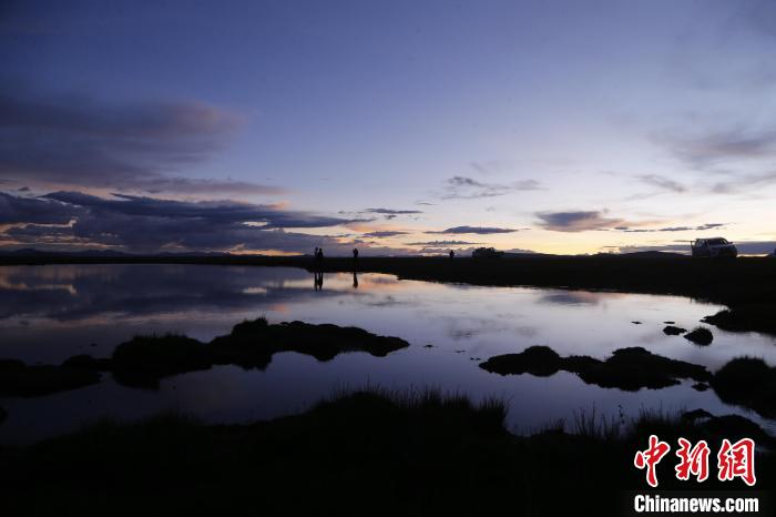 圖為夕陽下的查旦濕地?！●R銘言 攝